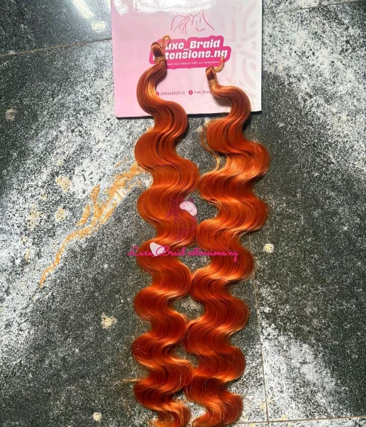 Ginger coloured body wave braiding extension