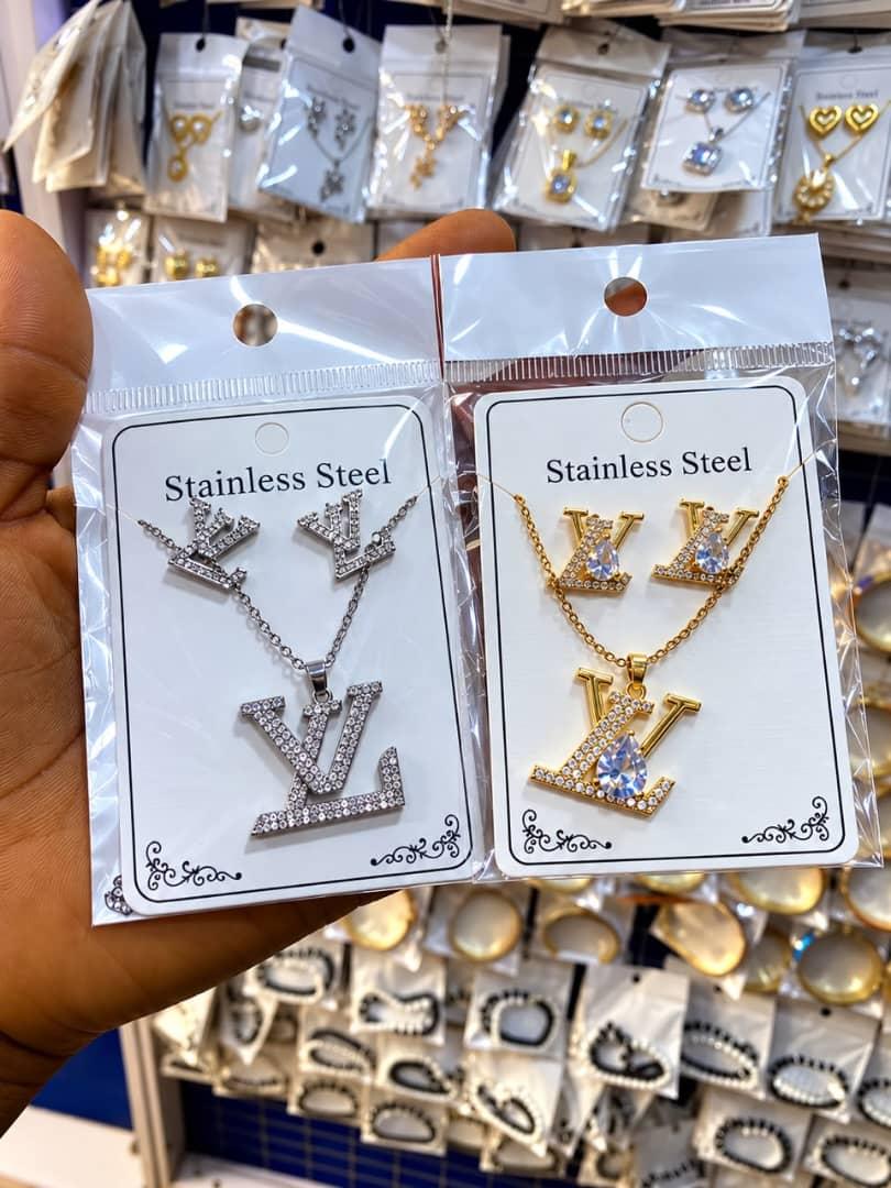 Stainless steel necklace and earring