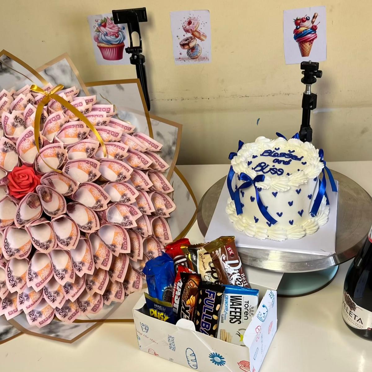 20k money bouquet, wine, box of chocolates, cake , wine