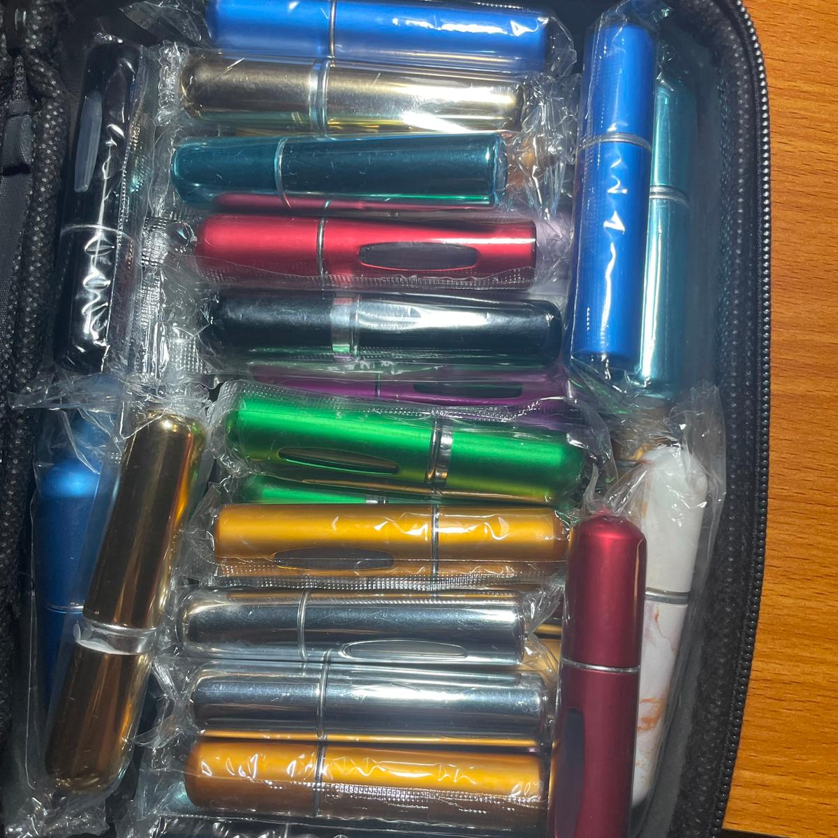 Perfume atomizers